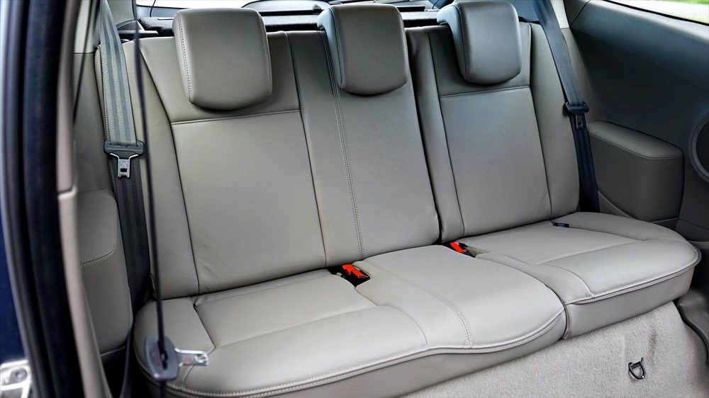 Car rear seats after cleaning, the fabric an even tone across both cushions